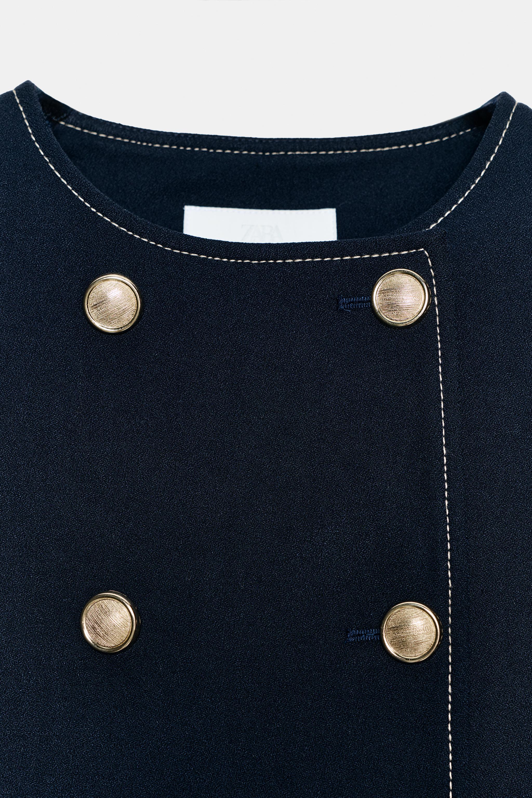 VESTE À MANCHES COURTES